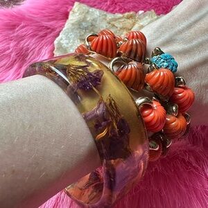 Pair of mid century bracelets, lucite and thermoset